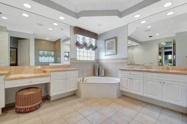 bathroom with recessed lighting, ornamental molding, vanity, a bath, and tile patterned floors