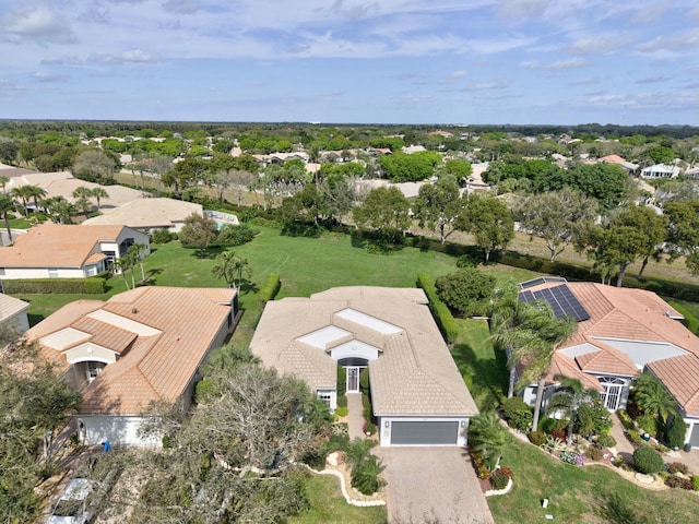 birds eye view of property with a residential view