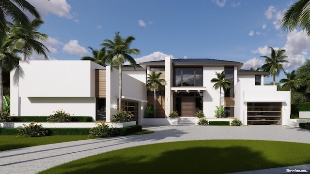 20 Ocean Dr, Jupiter Inlet Colony, FL 33469 - modern home featuring stucco siding, driveway, a standing seam roof, and metal roof