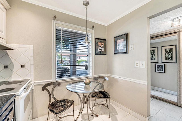 dining space featuring baseboards, marble finish floor, and crown molding