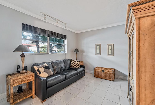 living room featuring light tile patterned floors, ornamental molding, track lighting, and baseboards