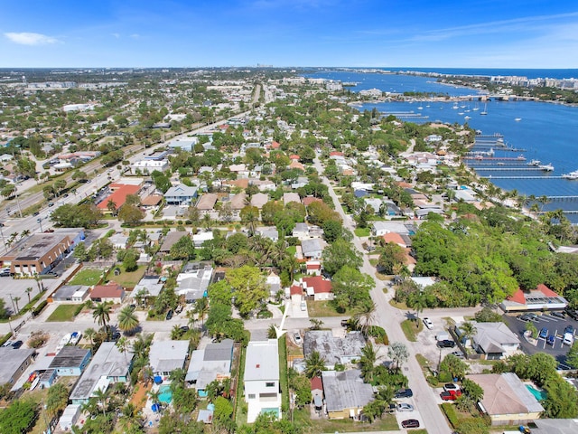 aerial view with a residential view and a water view