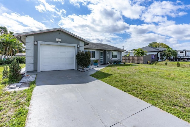 ranch-style home with a garage, fence, driveway, stucco siding, and a front lawn