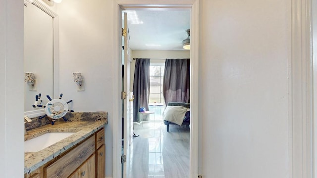 ensuite bathroom with ensuite bath and vanity