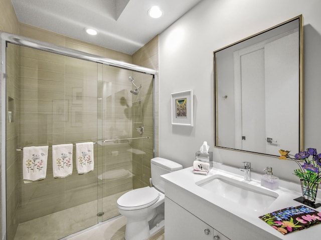 full bath featuring recessed lighting, vanity, toilet, and a shower stall