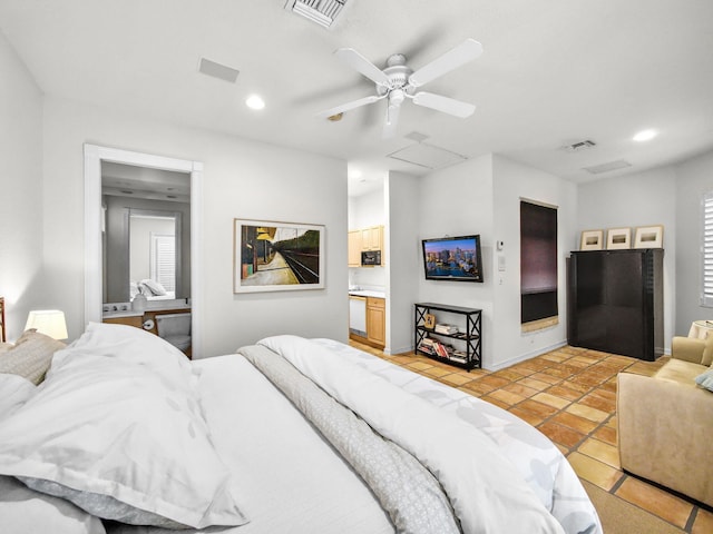 bedroom with attic access, visible vents, and recessed lighting