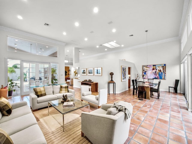 living room with french doors, crown molding, recessed lighting, visible vents, and a high ceiling