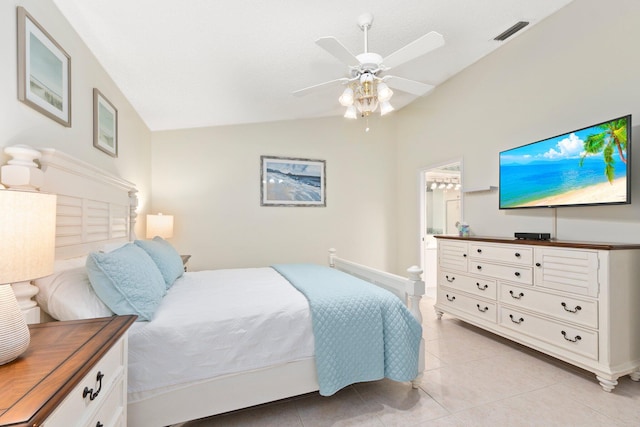 4214 SE Home Way, Port Saint Lucie, FL 34952 - bedroom featuring light tile patterned flooring, ceiling fan, vaulted ceiling, and visible vents
