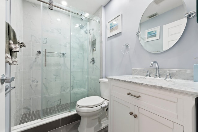 4214 SE Home Way, Port Saint Lucie, FL 34952 - bathroom featuring vanity, a shower stall, toilet, and visible vents