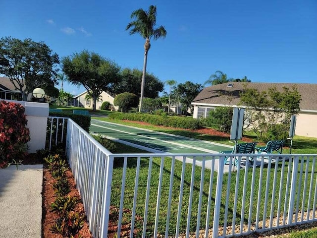 4214 SE Home Way, Port Saint Lucie, FL 34952 - view of yard featuring fence and shuffleboard