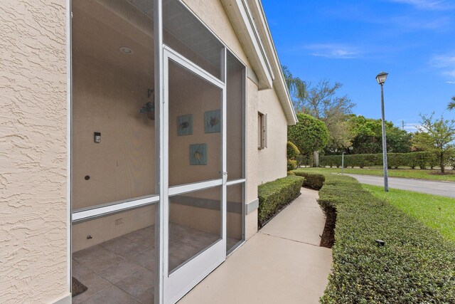 4214 SE Home Way, Port Saint Lucie, FL 34952 - entrance to property featuring stucco siding