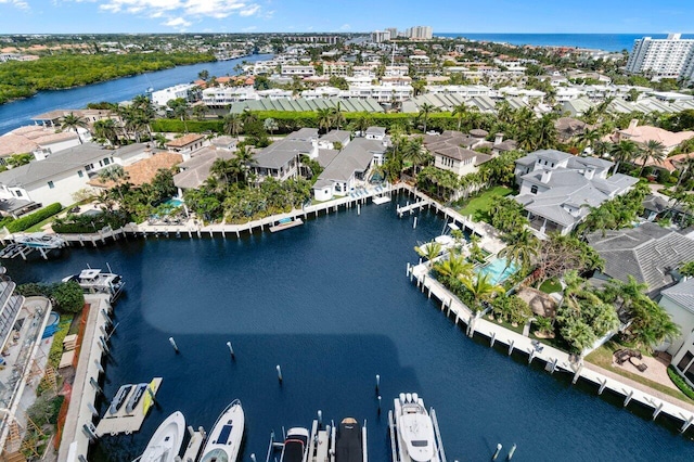 aerial view with a water view and a residential view