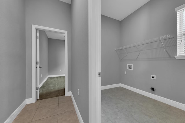 washroom featuring laundry area, hookup for a washing machine, baseboards, and electric dryer hookup