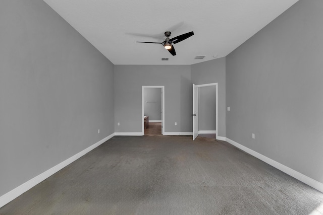 unfurnished bedroom with visible vents, ceiling fan, and baseboards