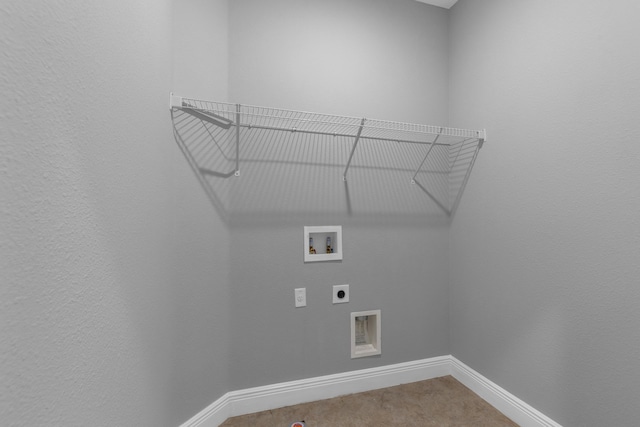 clothes washing area with laundry area, hookup for a washing machine, baseboards, and electric dryer hookup