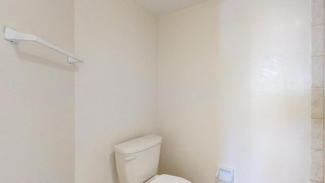 bathroom featuring toilet