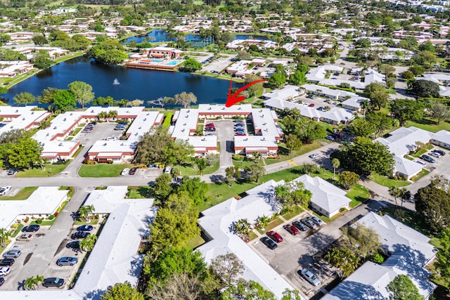 aerial view with a water view and a residential view