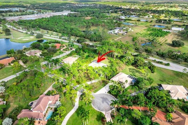 aerial view with a water view and a residential view