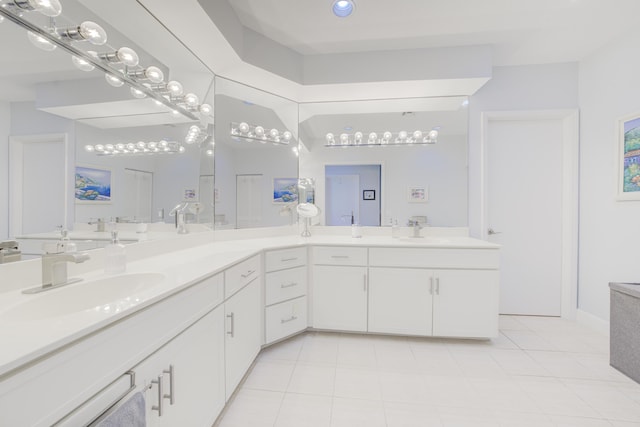 full bathroom with tile patterned flooring and vanity