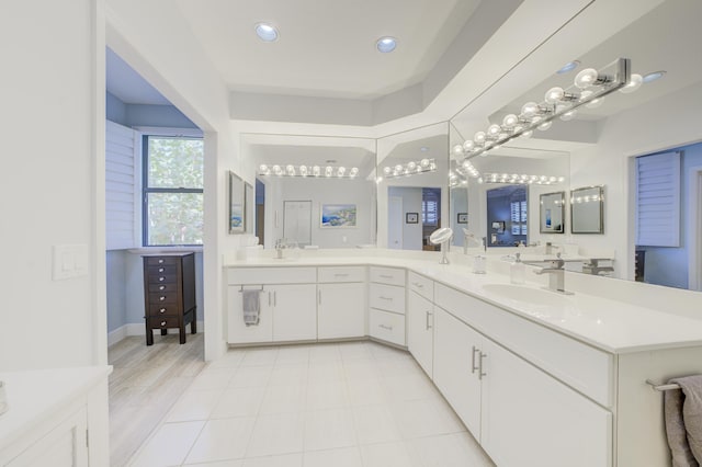 full bathroom with recessed lighting and vanity