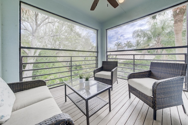 sunroom / solarium with ceiling fan