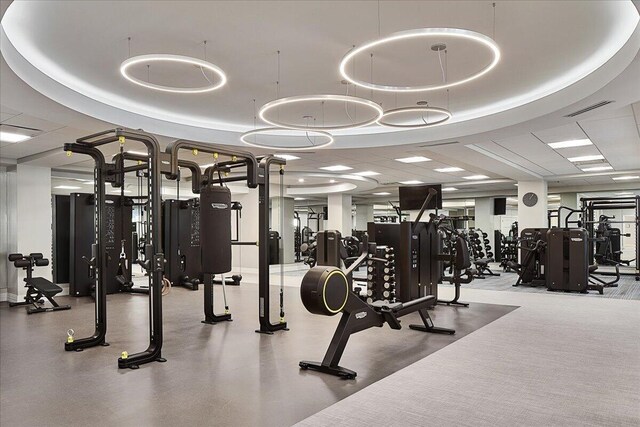 exercise room featuring visible vents