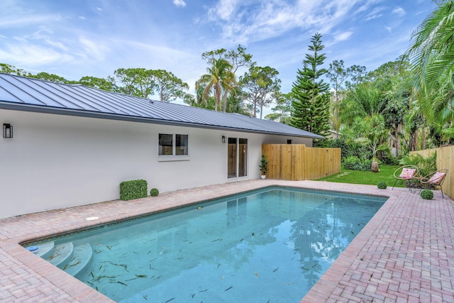 view of pool with fence