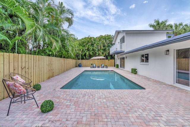 view of pool featuring a fenced backyard and a fenced in pool