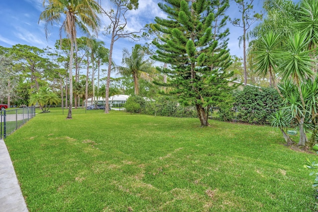 view of yard with fence