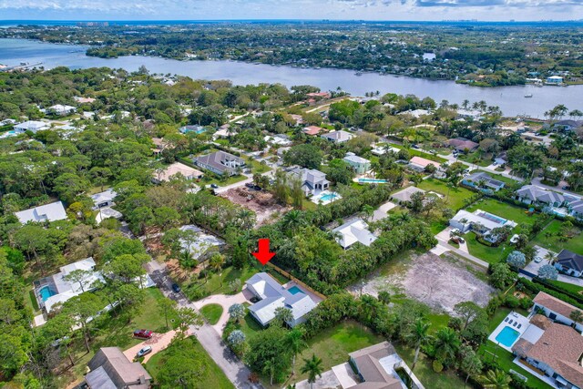 aerial view with a water view and a residential view