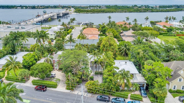 bird's eye view featuring a water view and a residential view