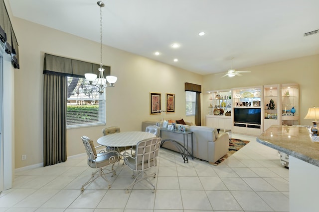 dining space featuring light tile patterned floors, ceiling fan with notable chandelier, visible vents, and recessed lighting