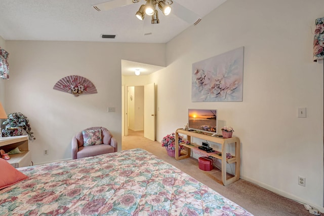 bedroom with lofted ceiling, ceiling fan, light carpet, visible vents, and baseboards