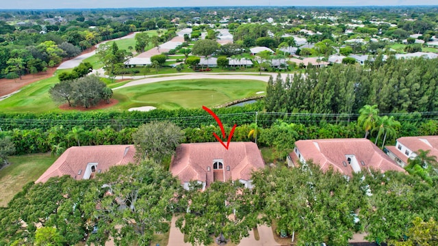 bird's eye view with view of golf course