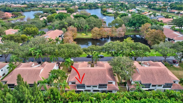 bird's eye view with a water view and a residential view