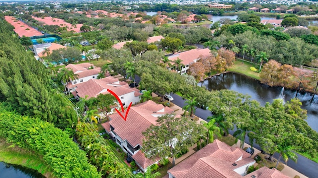 aerial view featuring a water view and a residential view