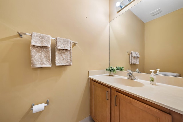 bathroom featuring visible vents and vanity