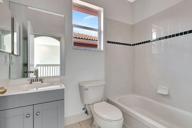 full bathroom featuring shower / bath combination, vanity, toilet, and tile patterned floors