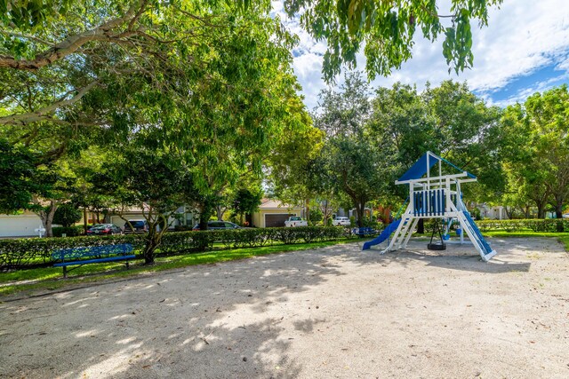 communal playground featuring fence