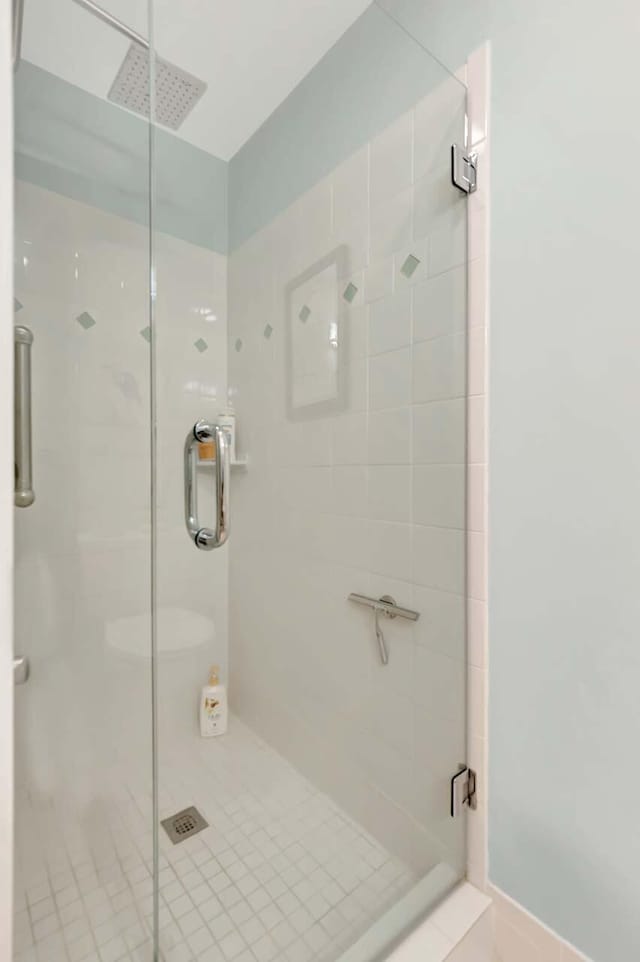 bathroom featuring a shower stall