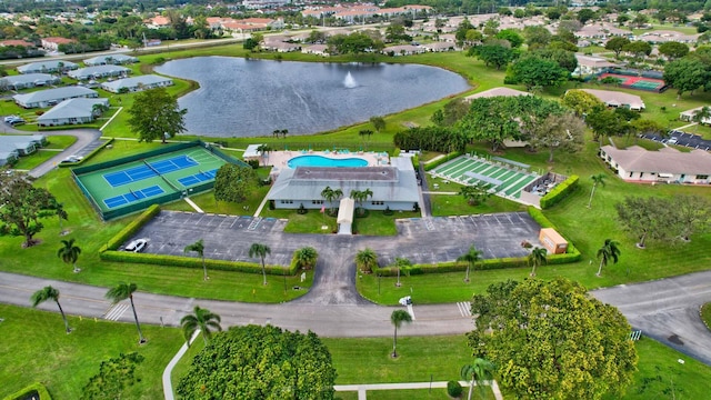 aerial view with a residential view and a water view