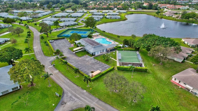 aerial view with a water view and a residential view