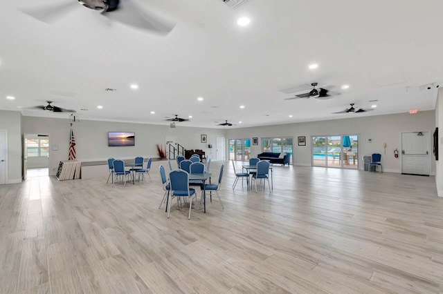 misc room with ceiling fan, light wood-style flooring, and recessed lighting