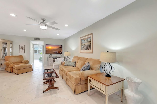 living area featuring a ceiling fan, recessed lighting, light tile patterned flooring, and visible vents