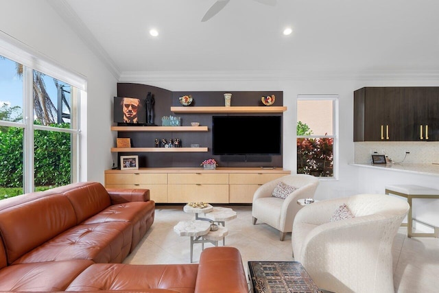 living room featuring light tile patterned floors, a ceiling fan, crown molding, and recessed lighting