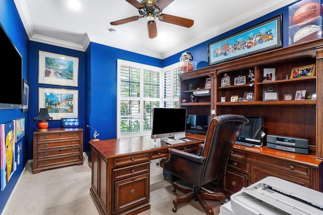 office space featuring light carpet, ceiling fan, and crown molding