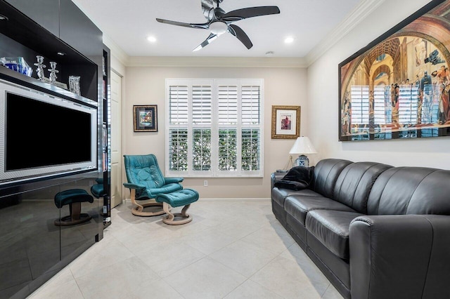 living room with light tile patterned floors, ceiling fan, and ornamental molding