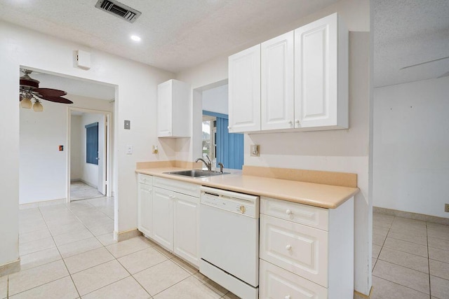 kitchen with ceiling fan, a sink, visible vents, white cabinetry, and dishwasher