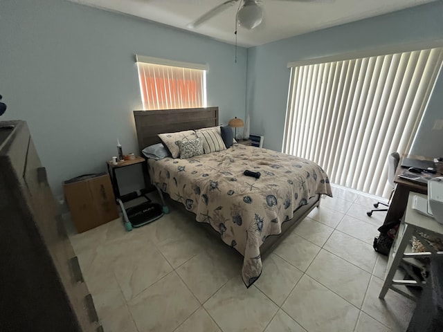 bedroom with light tile patterned floors