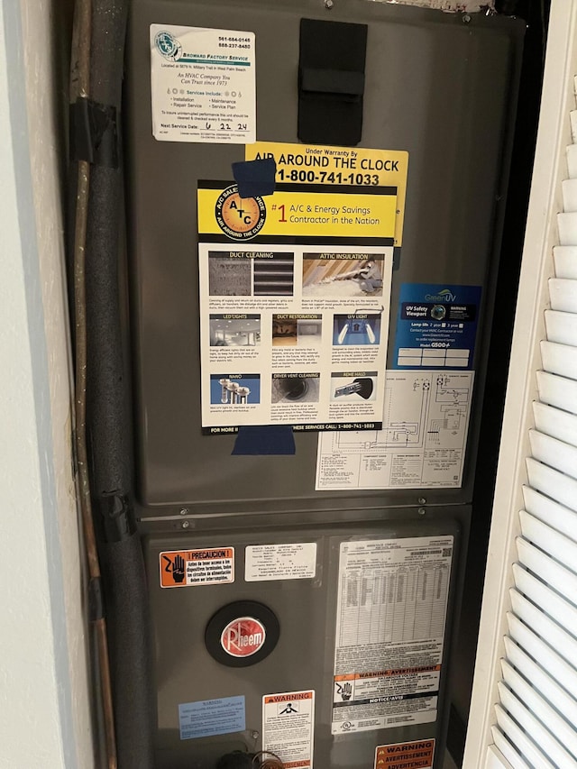 utility room with heating unit